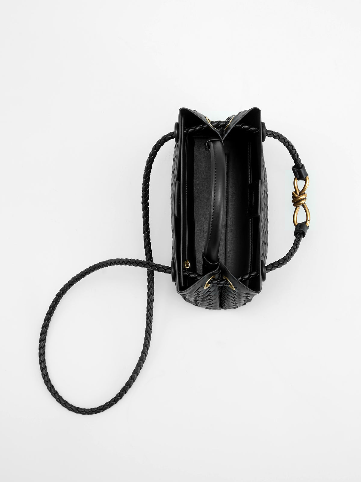 Sac avec poignée en métal torsadé