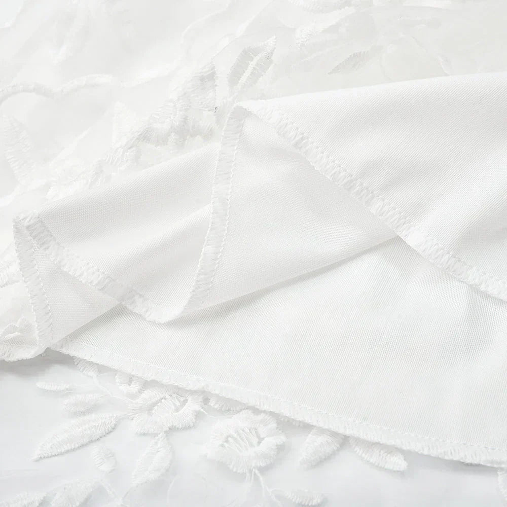 EDNA | Robe en dentelle blanche avec broderies florales